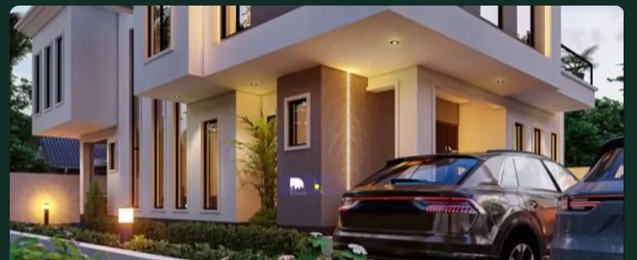 Modern two-storey duplex at dusk with warm interior lighting and a dark SUV