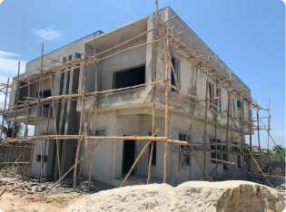 Building under construction with scaffolding