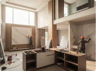 Interior under renovation with workers installing a kitchen